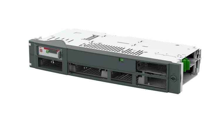 En grå elektronisk apparat med ventilationsspringor och en grön strömbrytare på ovansidan.