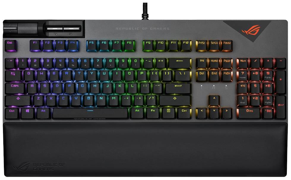 Mekaniskt gamingkeyboard med RGB-belysning; tangenterna är belysta i olika färger. Innehåller numeriskt tangentbord och multimediatangenter.