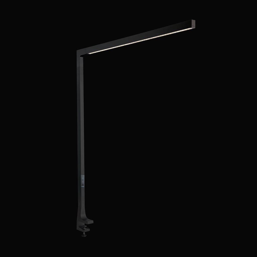 En modern, svart bordslampa med slank design som lyser ner uppifrån. Perfekt för minimalistiska arbetsytor.