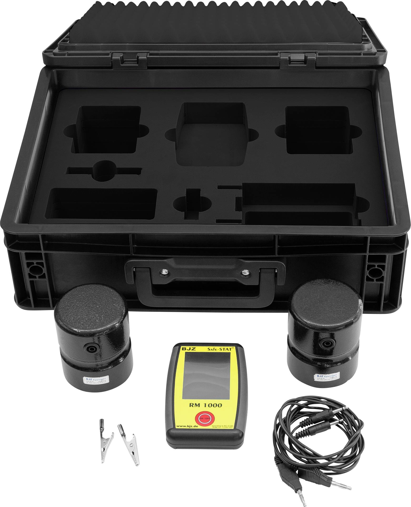 Ett fodral med skuminsatser för förvaring av elektroniska mätinstrument, två sensorer, en kontrollenhet och kablar.