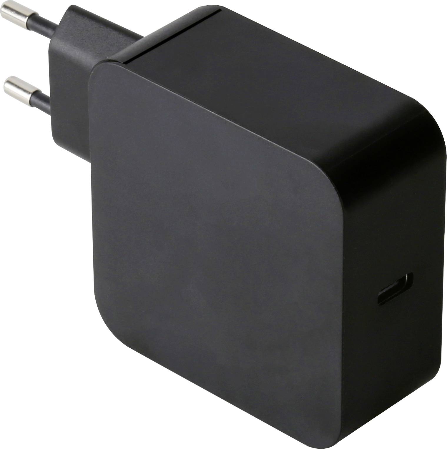 En svart rektangulär nätadapter med en europlug och en USB-C-port på sidan, avsedd för laddning av elektroniska enheter.