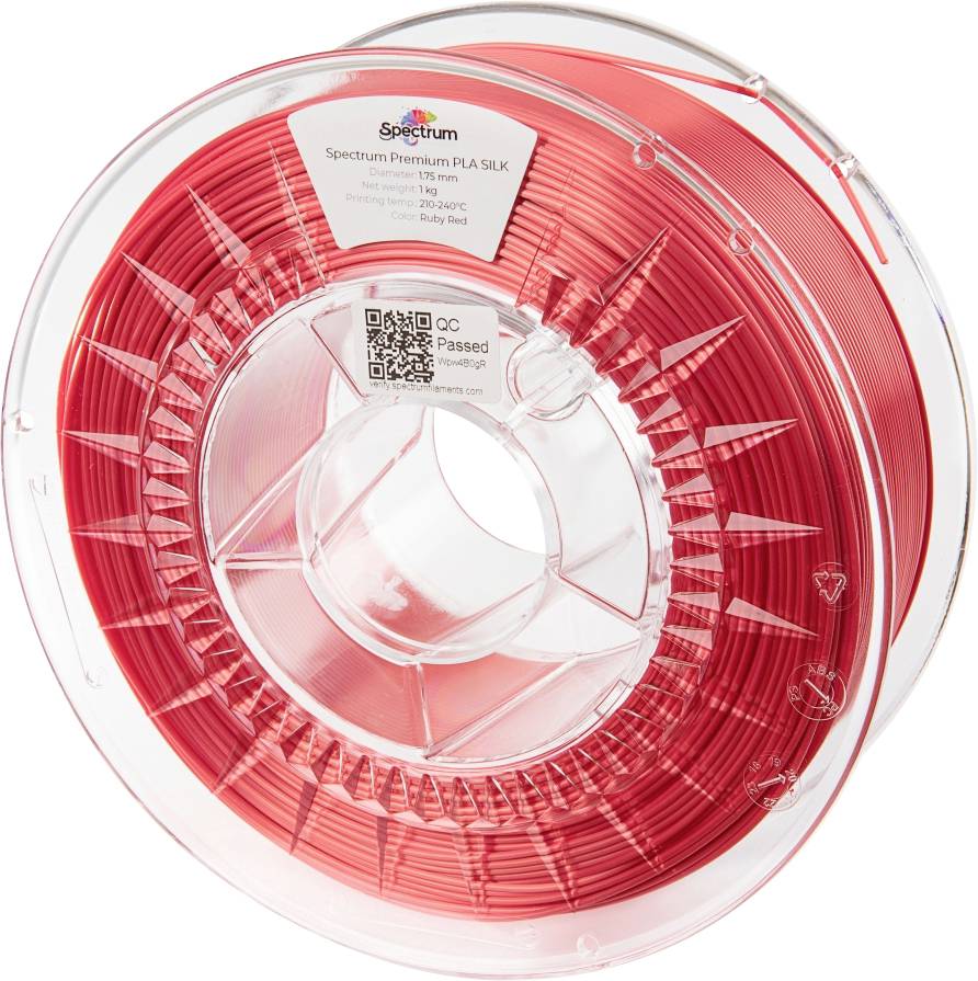 Rulle med rött PLA-filament för 3D-skrivare, märke Spectrum Premium, text på etikett: 'PLA SILK, Ruby Red, 1.75mm, 1kg'.
