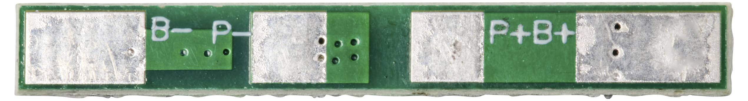 En grön, rektangulär elektronisk komponent med silvriga kontakter och märkningarna 'B-', 'P-', 'P+', 'B+'.