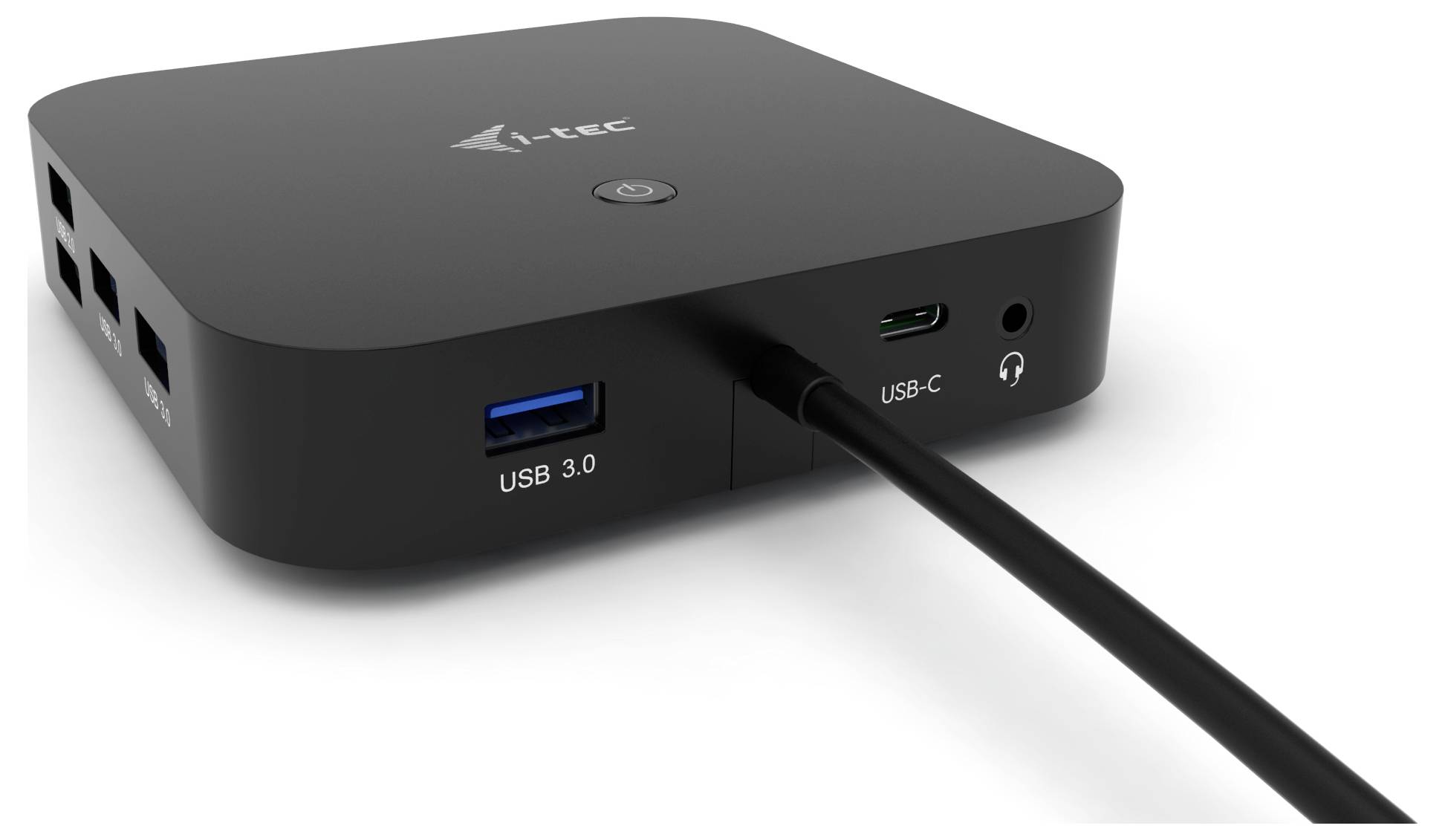 En svart dockningsstation med flera USB-portar, inklusive en USB 3.0-port, en USB-C-port och en nätadapteranslutning.