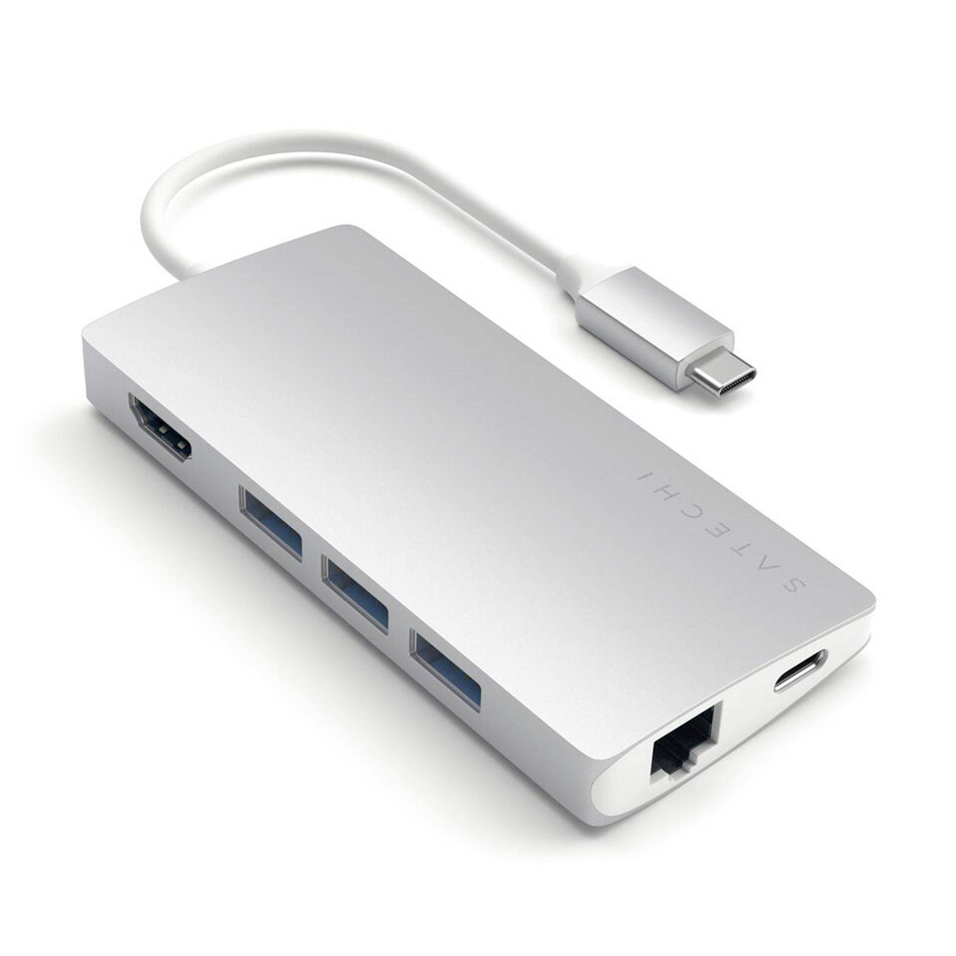 En silverfärgad USB-C-hub med flera portar: USB, HDMI, Ethernet och USB-C-strömport. Perfekt för att ansluta flera enheter till en bärbar dator.