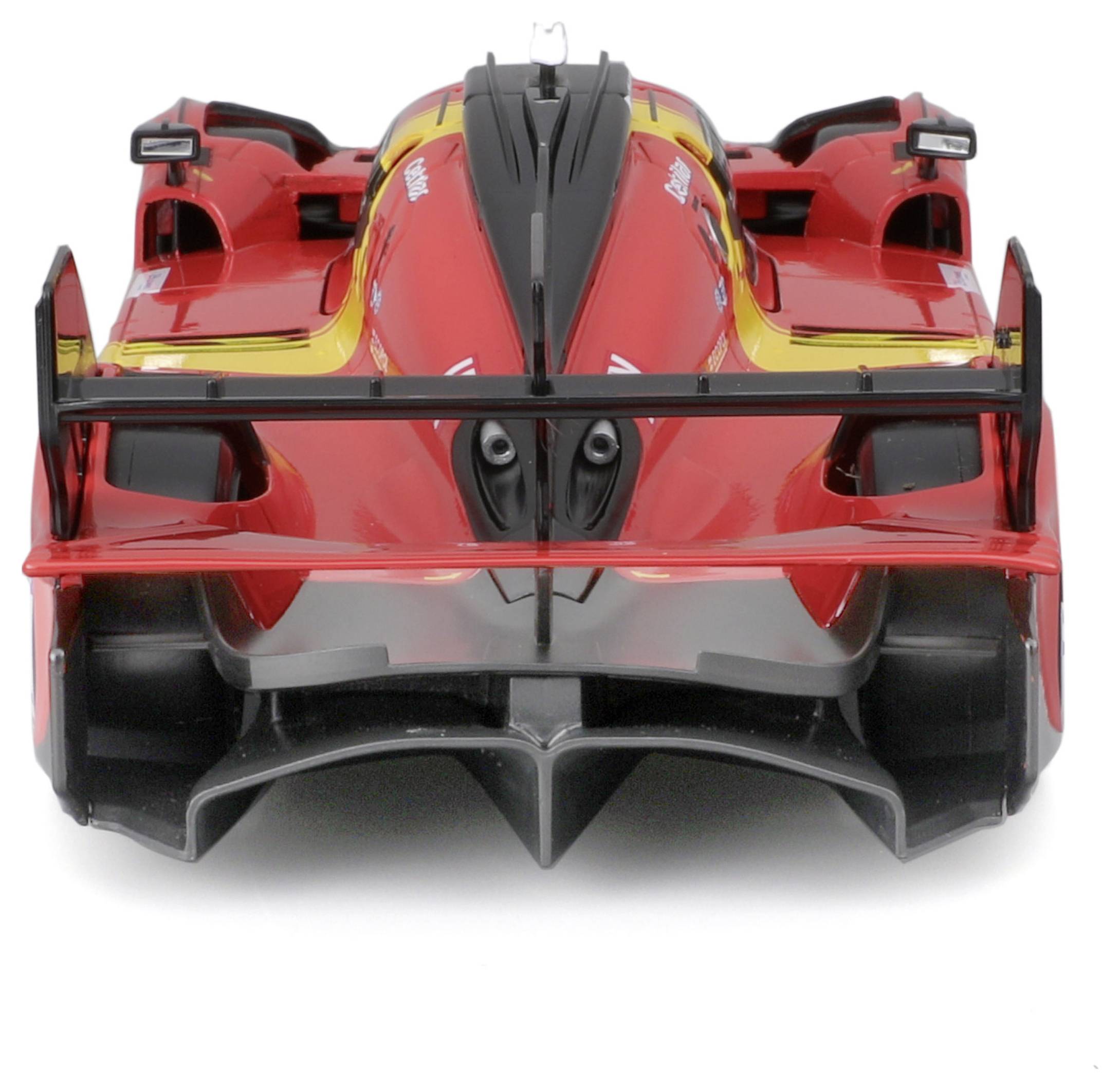 En röd racerbilsmodell sedd bakifrån. Aerodynamisk design med markanta vingar och ventilationsöppningar. Sportig framtoning.