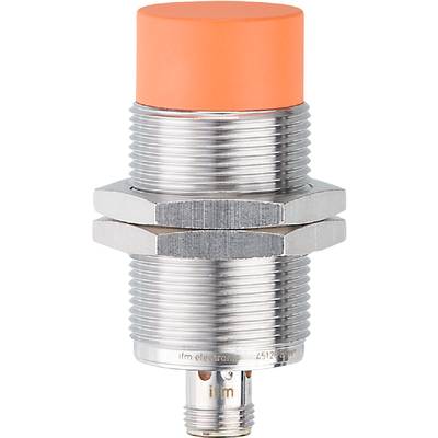 En silverfärgad cylindrisk metallsensor med orange huvud. Den har gängad anslutning och används för att detektera närvaro eller närhet.
