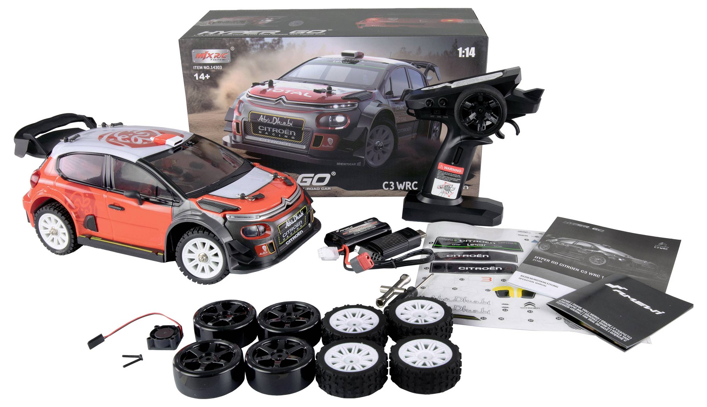 Fjärrstyrd bil i rallystil, röd-vit, med tillbehör som fjärrkontroll, reservdäck och instruktionsbok. Förpackningen visar bild av bilen.