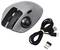 Trådlös, grå ergonomisk mus med trackball, USB-mottagare och kabel.