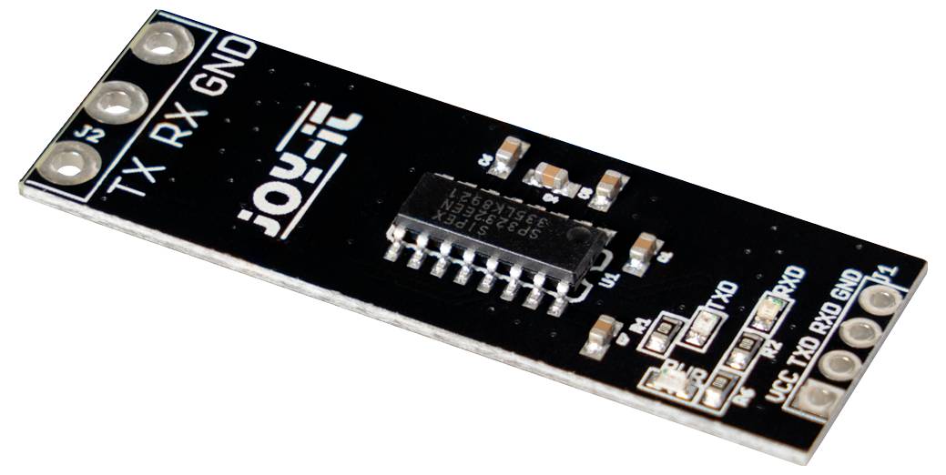 Elektronisk kretskort med märkningar 'TX', 'RX', 'GND'. Innehåller integrerad krets och flera anslutningar.