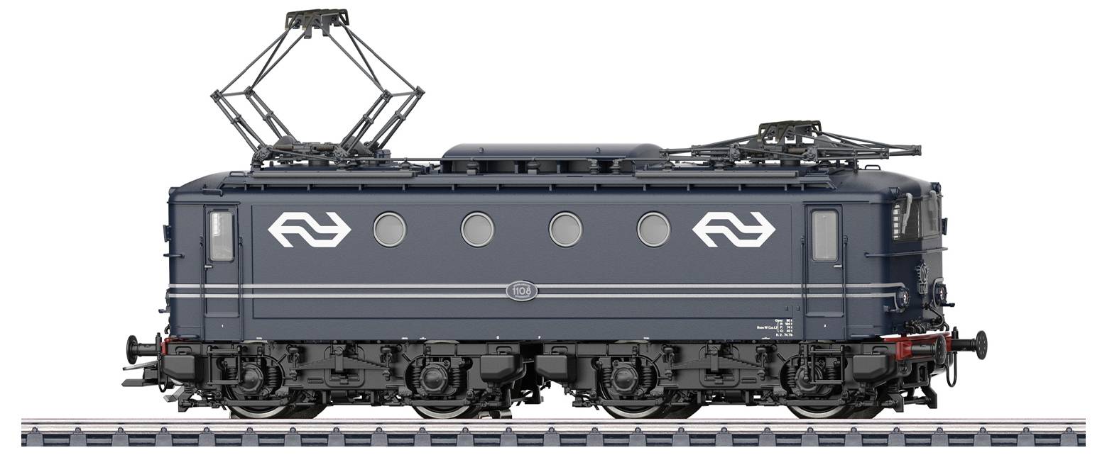 En mörkblå elektrisk tåglokomotive med runda fönster och svarta hjul står på spåren, markerad med en vit logotyp.