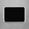 En svart, rektangulär tavla med vit ram hänger på en grå vägg. Den ser ut som en modern, teknisk apparat.
