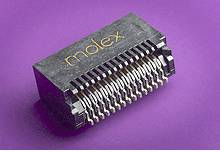 En svart elektrisk kontakt med guldskrift 'molex' på violett bakgrund, visar flera anslutningsstift.