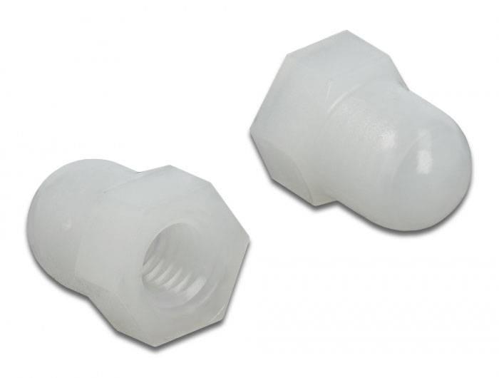 Två vita plastskruvlock, ett liggande med synligt invändigt gängsystem, det andra stående.