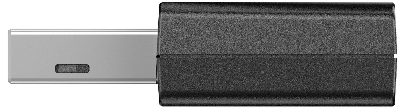 En svart USB-sticka ligger horisontellt, med den silverfärgade anslutningssidan vänd åt vänster.