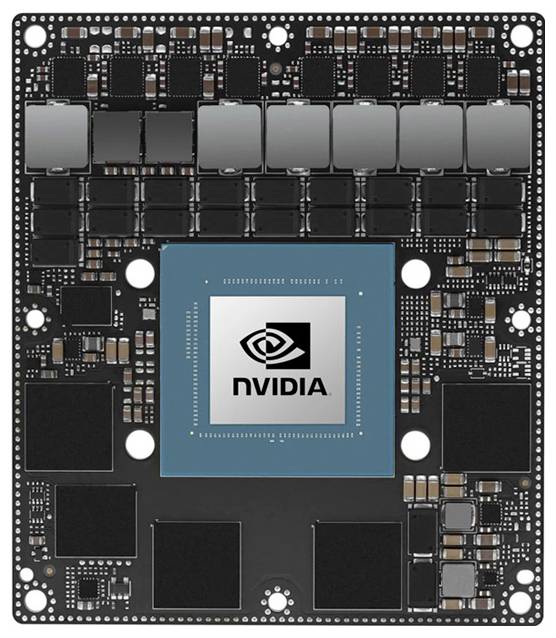 Kretskort med en central, blå chip med 'NVIDIA'-logotyp, omgiven av ett flertal mindre komponenter, sannolikt för datorhårdvara.