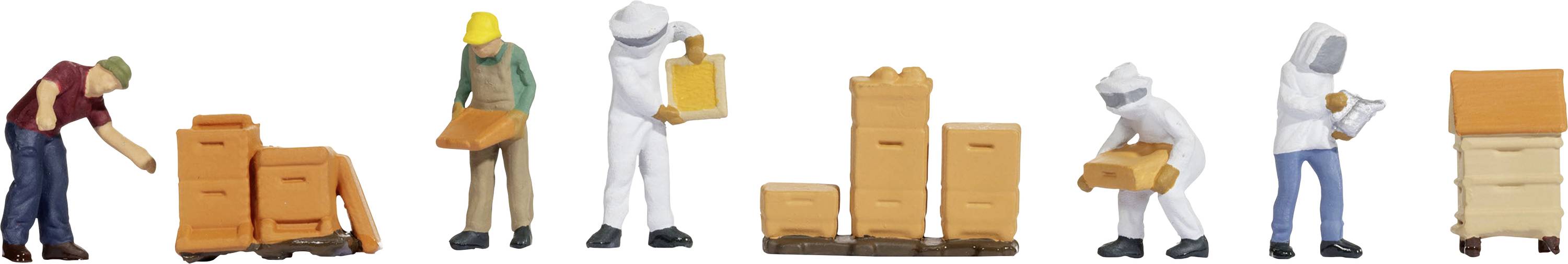 Flera miniatyrfigurer visar processen för biodling, från förberedelser och skyddsutrustning till arbetet med bisamhällen.