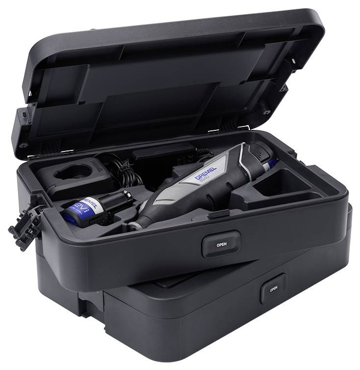 Elektriskt multiverktyg i ett öppet svart fodral med tillbehör. Perfekt för hemmafixande och reparationer.