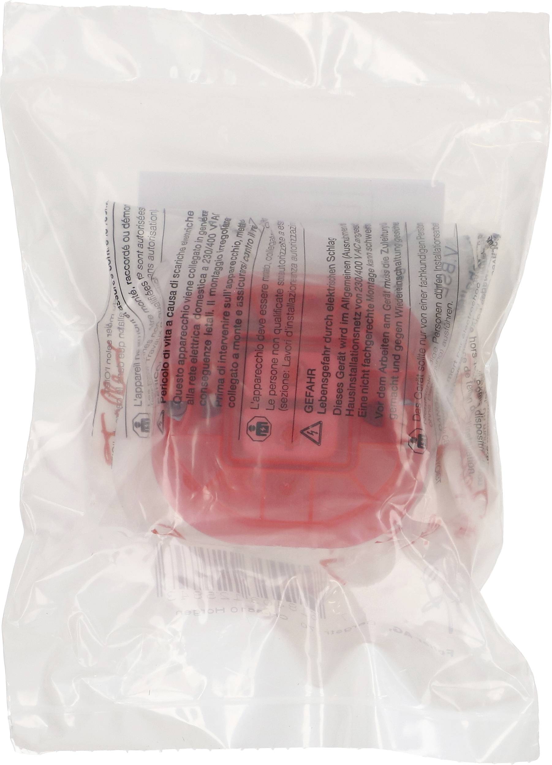 En röd inslaget produkt i en plastförpackning med text och symboler på förpackningen.