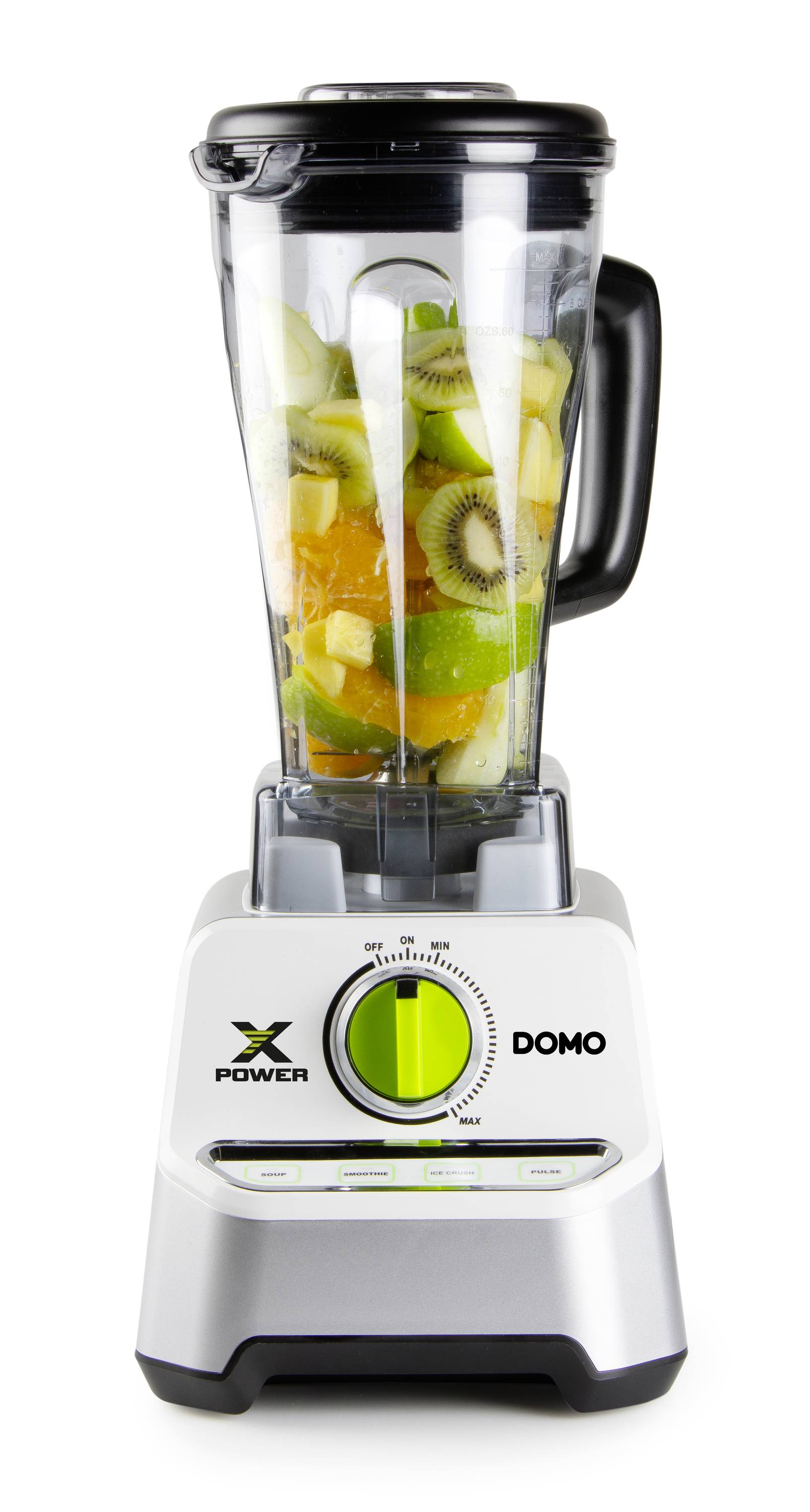 Mixer fylld med skurna frukter som kiwi och apelsin. Mixern har ett svart lock och en vred med en grön markering.