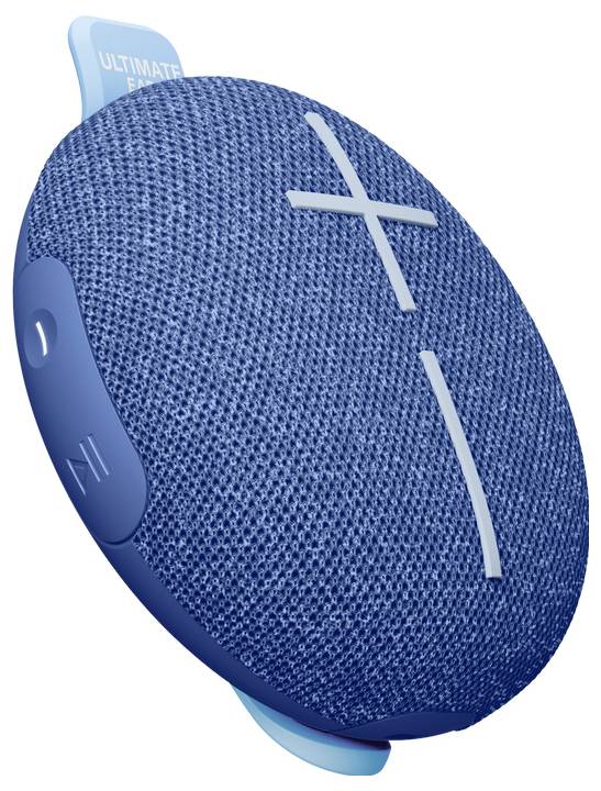 Bärbar blå Bluetooth-högtalare i rund form med stora plus- och minussymboler för volymreglering.