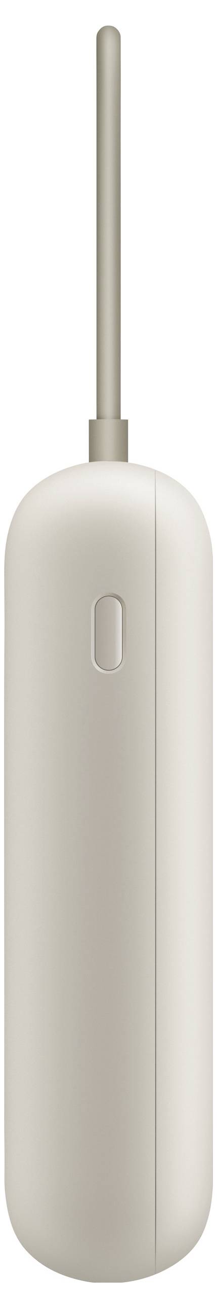 En beige, cylinderformad elborste med ett smalt skaft och en liten strömknapp nära toppen.