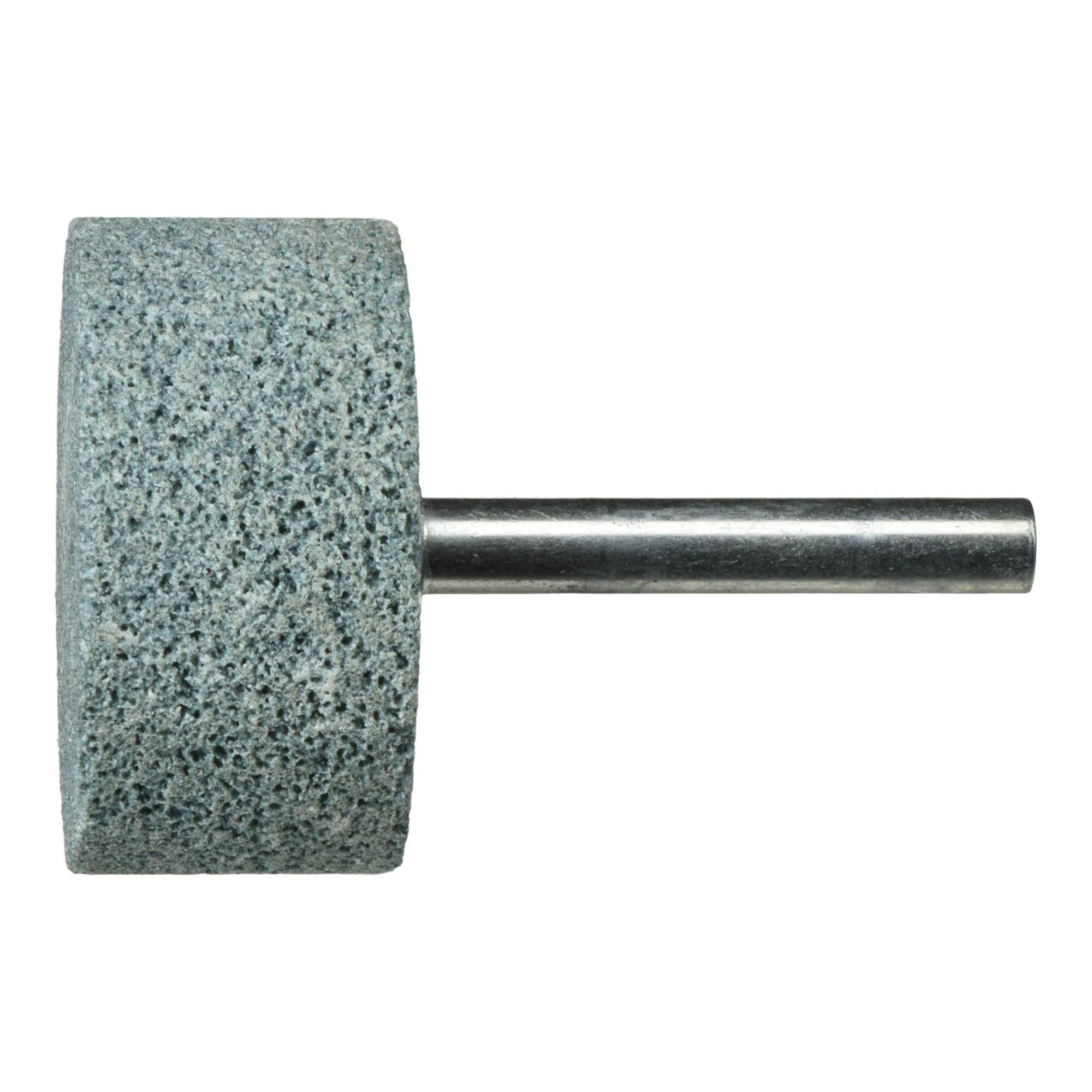 En grå cylindrisk slipsten med ett metallskaft, använd för att vässa eller forma material.