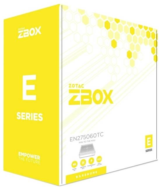 Gul och vit förpackning för Zotac ZBOX E-serien miniPC, modell EN27506TC. Inkluderar hexagonmönster och sloganen 'Empower the Future'.