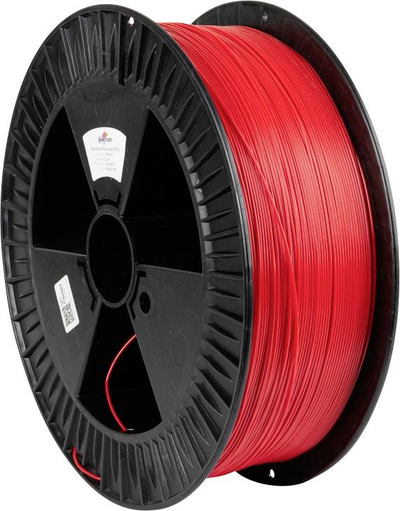 En rulle röd 3D-skrivarefilament med en svart spole.