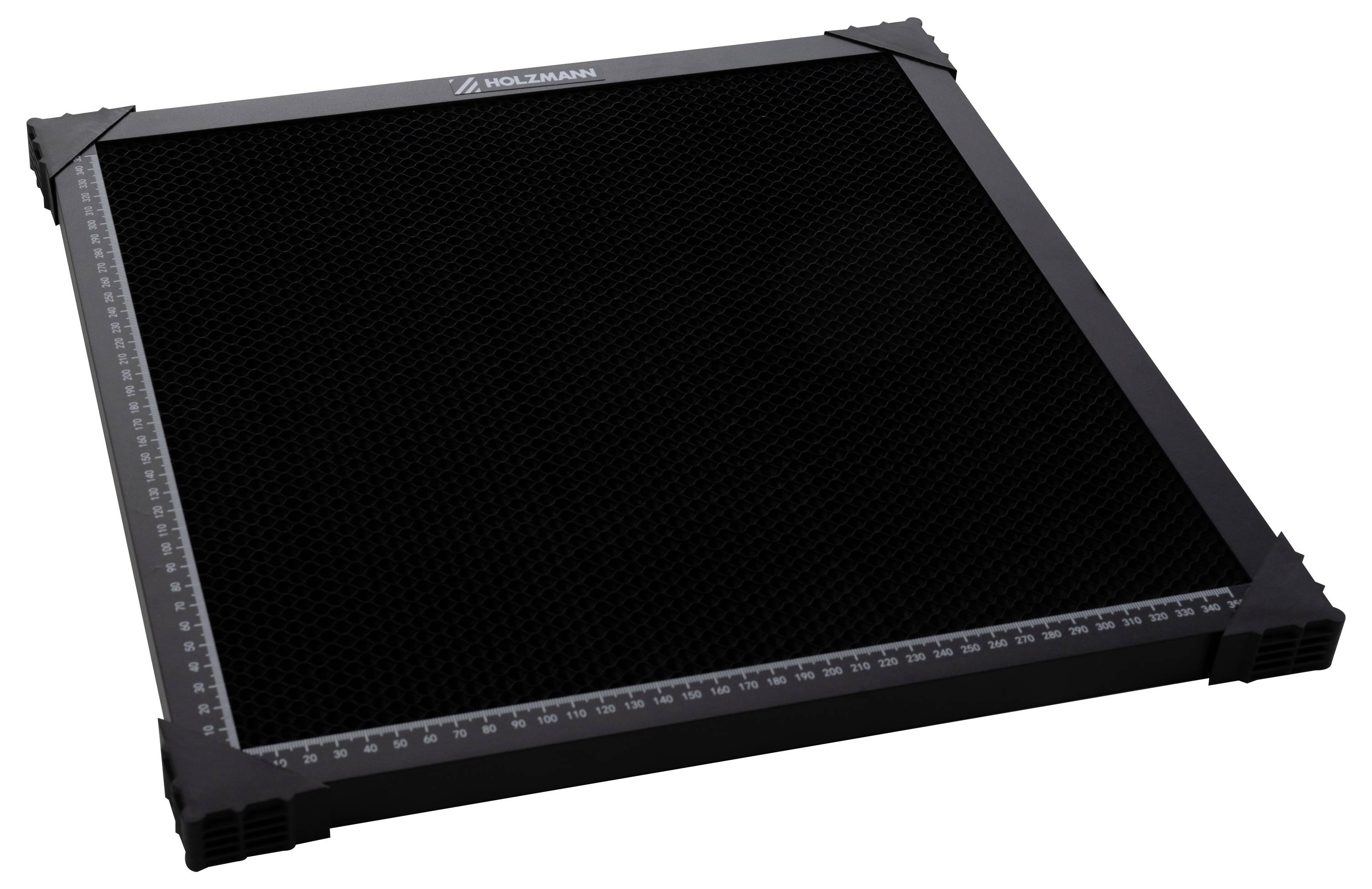 Svart magnetisk honeycomb-bädd för 3D-printing, med centimeter- och tummarkeringar längs varje kant, kapabel att hålla föremål med magneter.