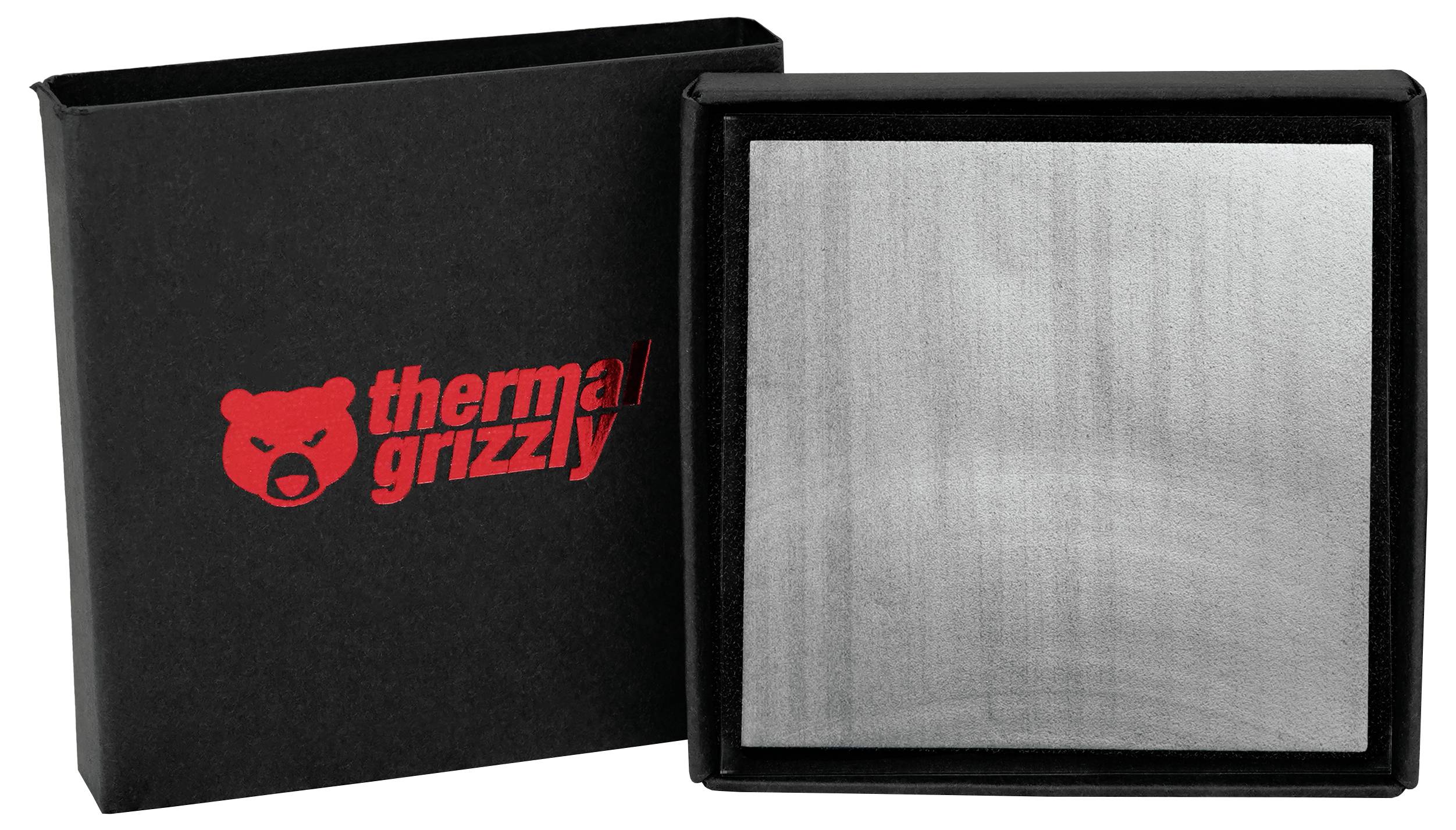 'thermal grizzly' logotyp i rött på en svart låda bredvid en öppnad fyrkantig behållare som visar en metallisk dyna inuti.