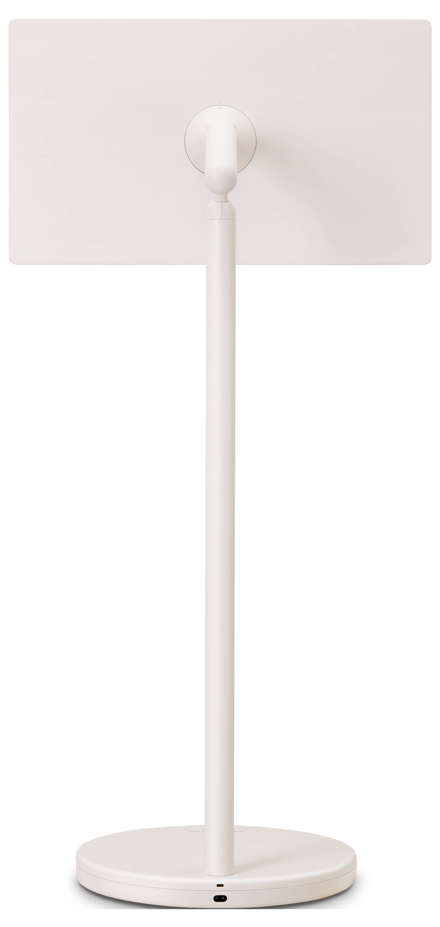 En vit golvfläkt med en cirkulär bas och upprätt design, sedd bakifrån.