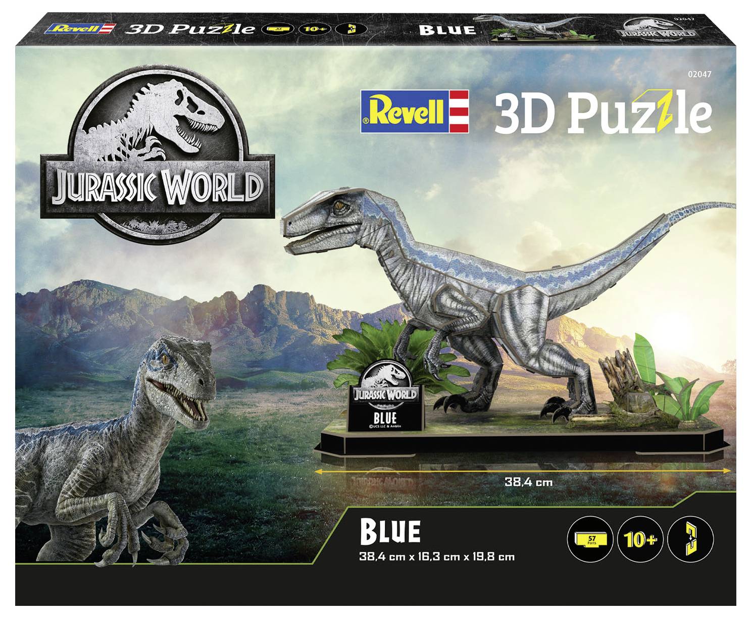 Låda för ett 'Jurassic World' 3D-pussel föreställande dinosaurien Blue. Visar varumärkets logotyp, lämplig ålder, dimensioner: 38,4 cm x 16,3 cm x 19,8 cm.