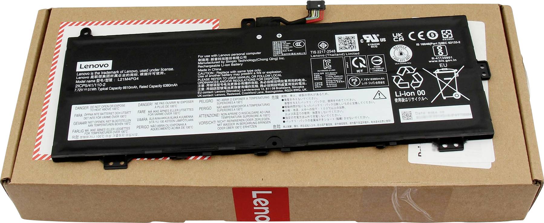Lenovobärbar dators batteri på brun kartongförpackning, med varumärke och specifikationer synliga, inklusive logotyper och säkerhetsvarningar.