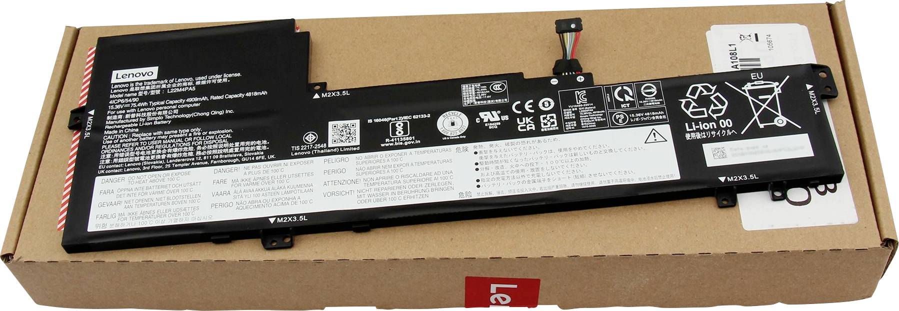 En svart Lenovo litiumjonbatteri placerad på ett kartongunderlag med synliga specifikationer och återvinningssymboler.