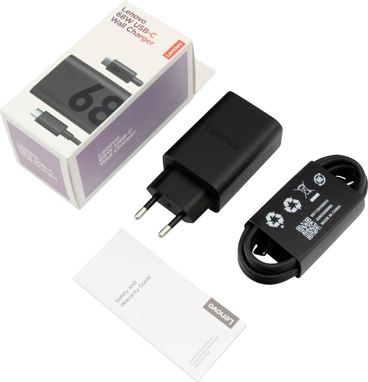 "Lenovo 68W USB-C Väggladdare" låda, laddare, kabel och Säkerhets-/garantiguide visas.