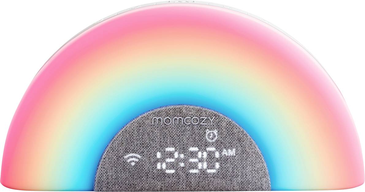 En digital väckarklocka med en regnbågsfärgad ljusslinga ovanpå visar '6:30 FM' med Wi-Fi- och strömikoner.