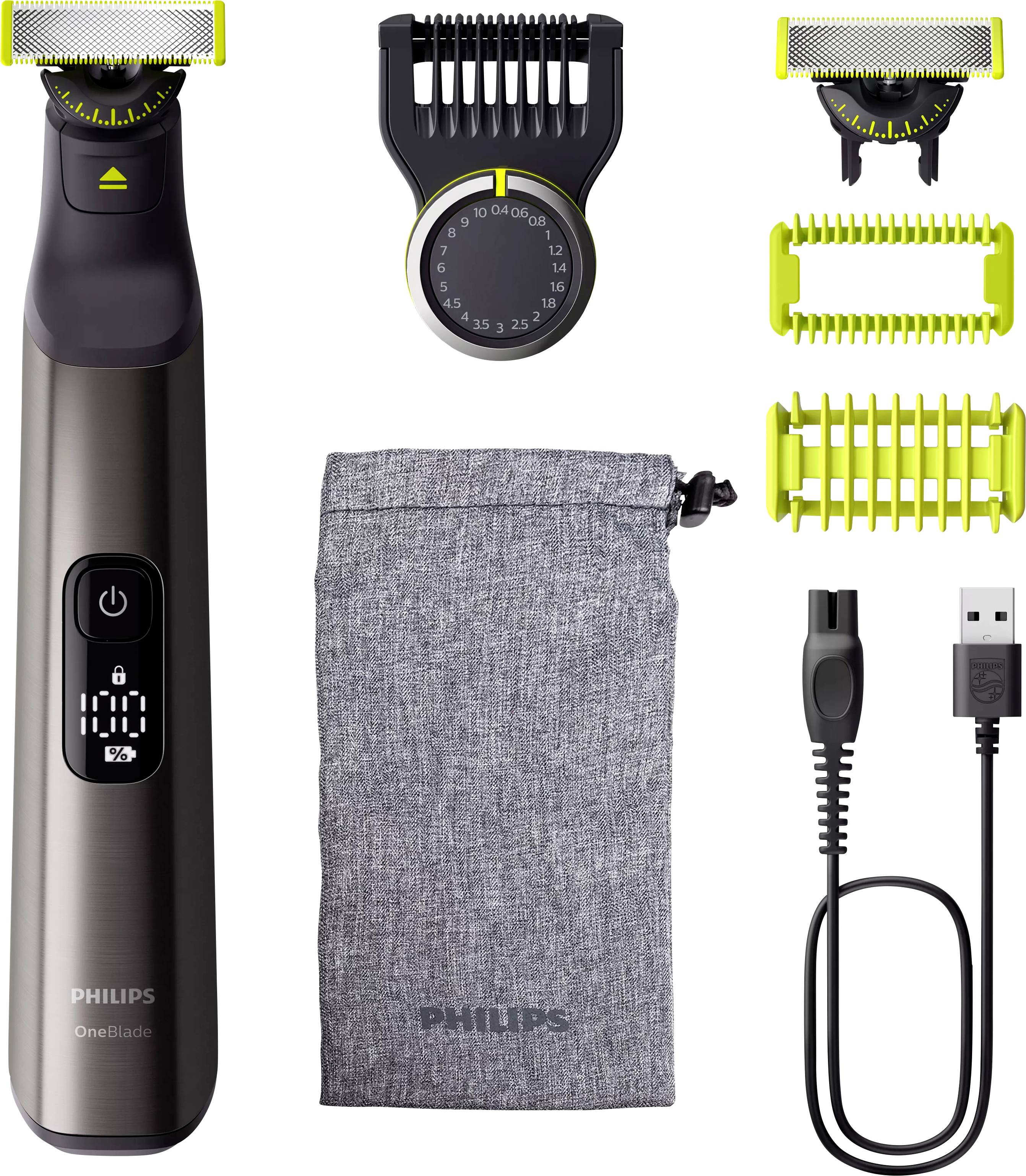 Elektrisk grooming-kit med trimmer, justerbar längdkam, precisionskommar, laddare och en förvaringsväska. Perfekt för rakning och styling.
