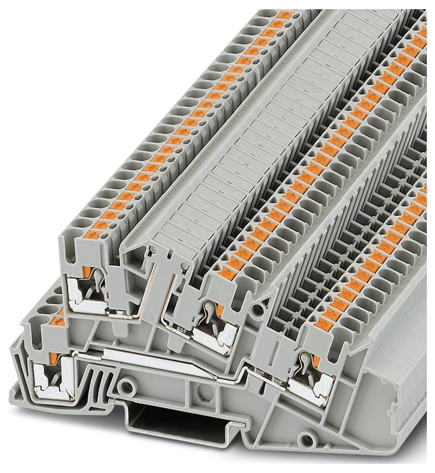 Grå och orange industriella klämmblock staplade tillsammans, med flera anslutningspunkter för ledningsapplikationer.
