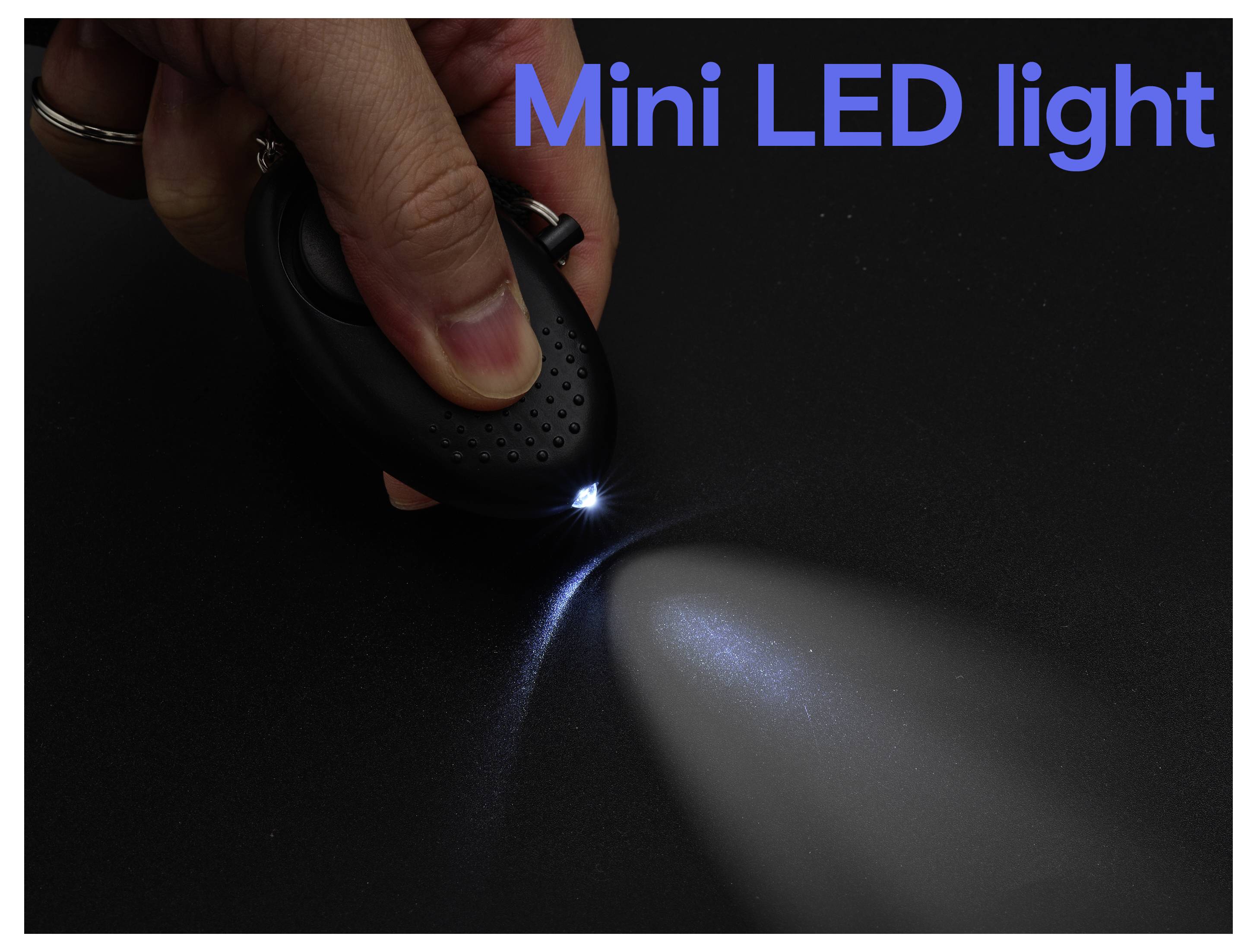 Hand som håller en liten mini LED-lampa som lyser en smal stråle i mörkret, med texten "Mini LED-lampa" överst.