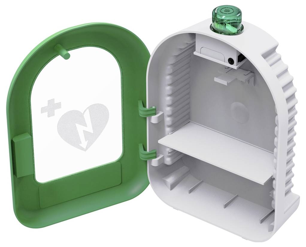 Öppen grön-och-vit medicinsk dispenserskrin med tomt fack och en hjärta-plus-symbol på insidan av luckan.