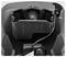 En närbild av en tvättmaskinstrumla med ett distinkt svart dräneringsfack och slang, som belyser intern design och textur.