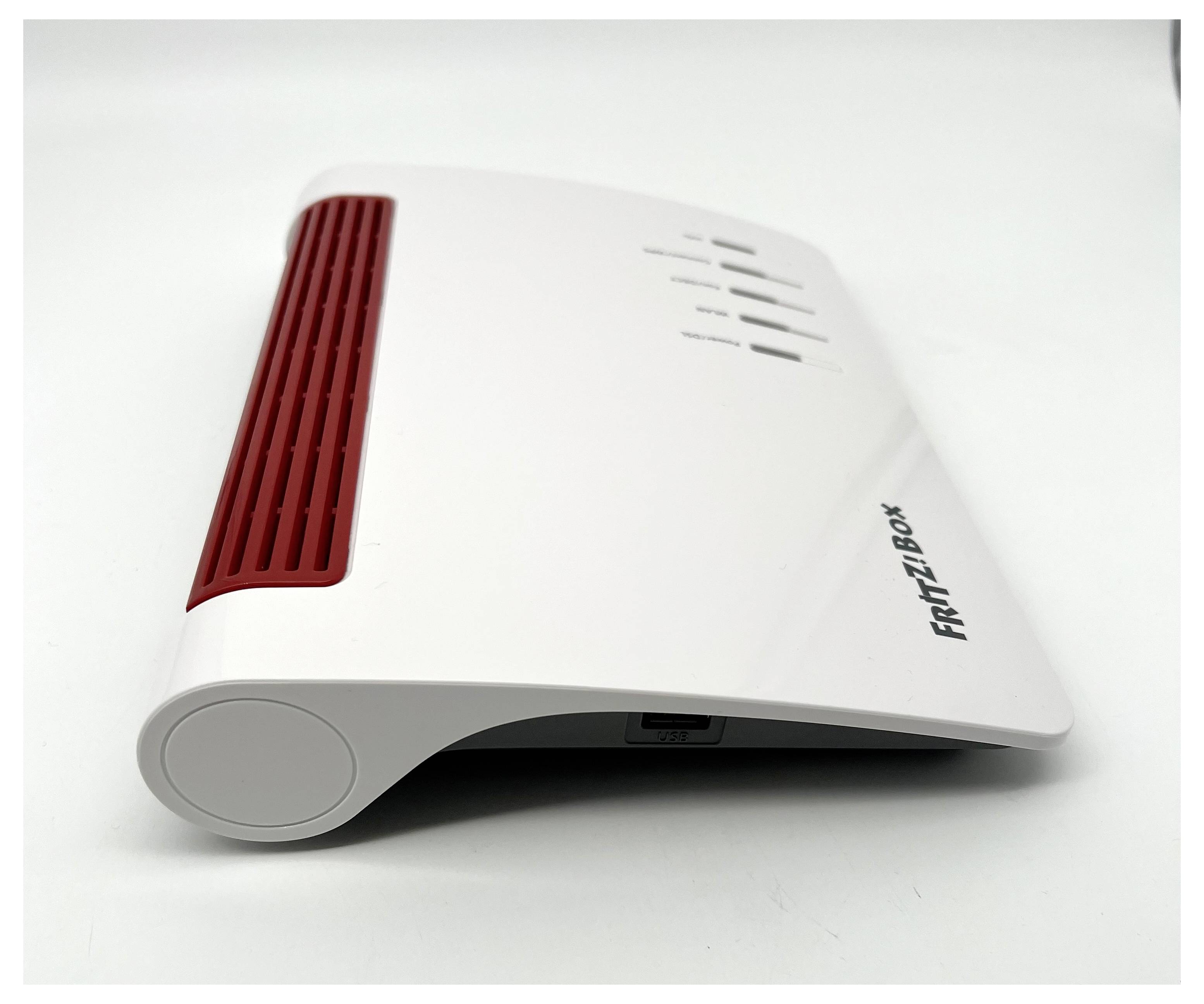 En vit och röd Wi-Fi-router med titeln "FRITZ!Box" med ventilationshål på toppen och flera indikatorer.