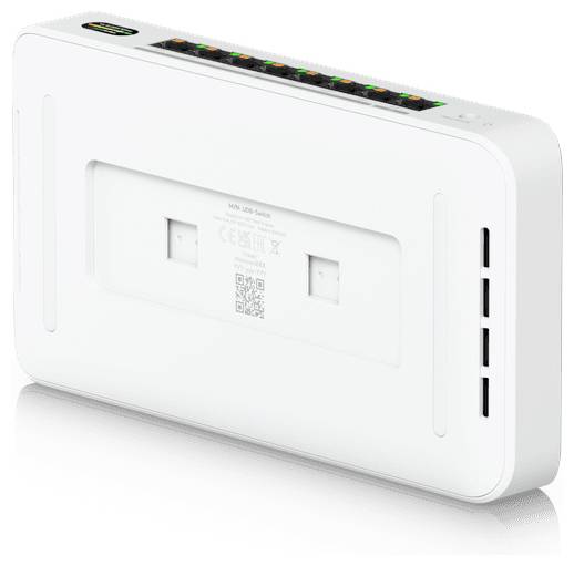 En vit Wi-Fi-router med flera indikeringsljus och portar på toppen, med en elegant, rektangulär design med rundade kanter.