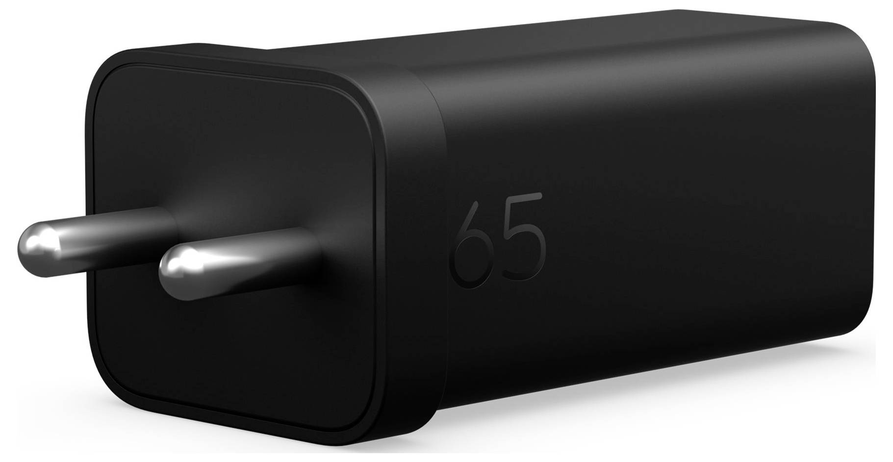 Svart 65W-strömadapter med två runda stift, visad mot vit bakgrund.