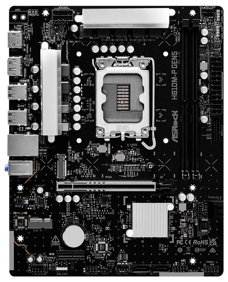 Ovanifrån-vy av ett svart ASRock H310M-GENE-moderkort med CPU-uttag, RAM-plats, expansionsplatser, bakre portar och chipset-värmespreader.