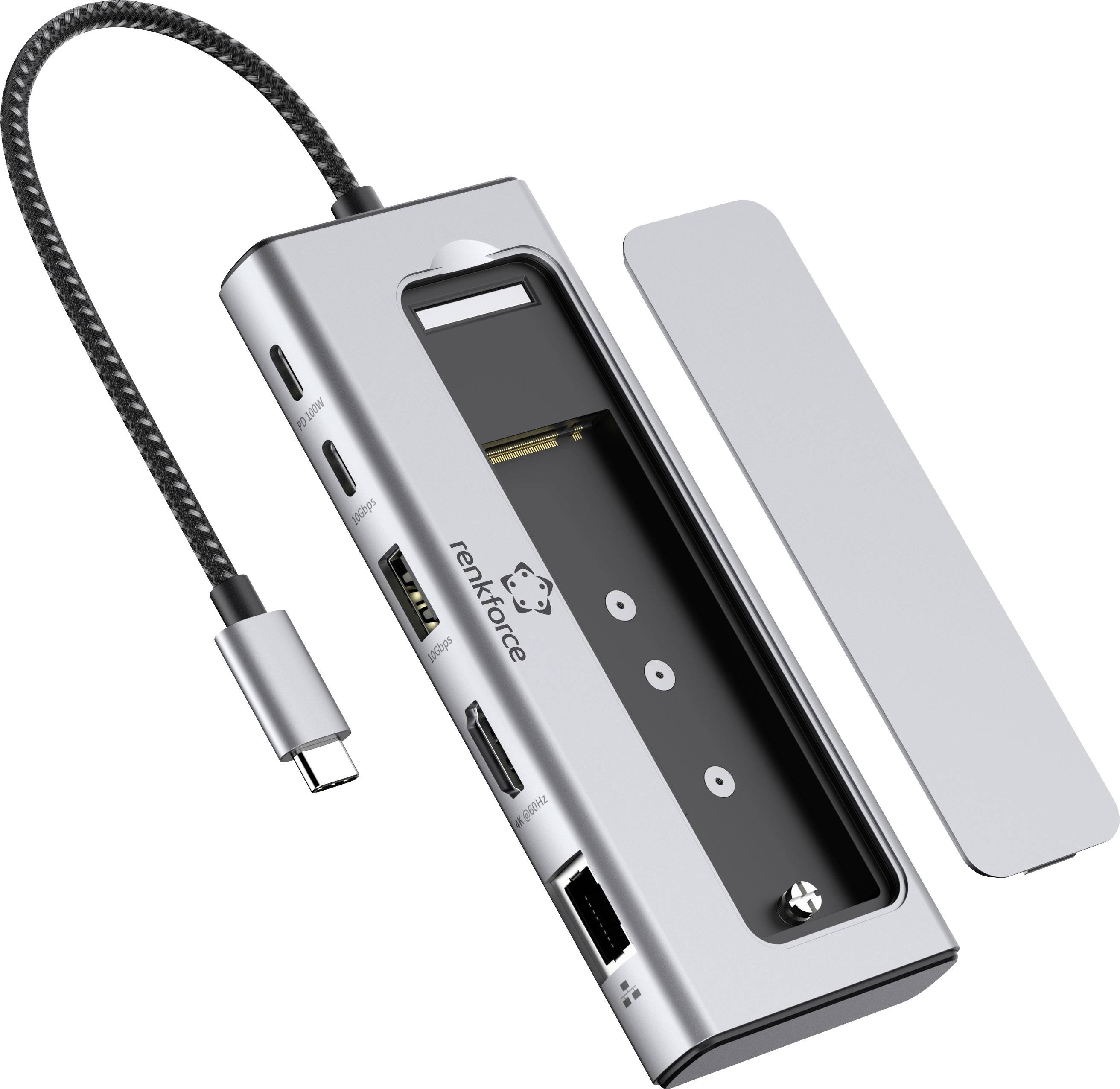 Silvergrå USB-C laptopsdockningsstation med bifogad flätad USB-C-kabel och ett avtagbart magnetiskt skydd, vilket visar flera portar.