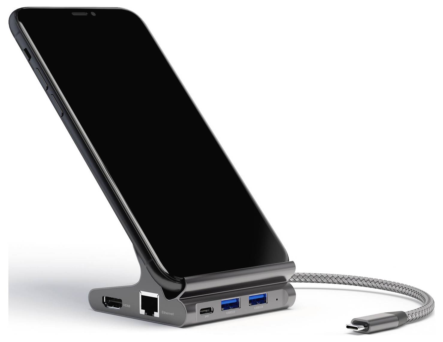Smartphone-laddningsdocka som håller telefonen upprätt, med USB-portar och en flätad laddningskabel ansluten.