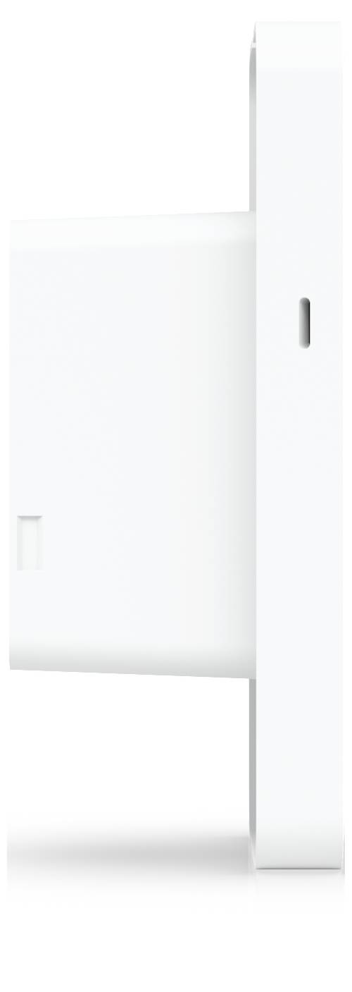 Minimalistisk vit rektangulär väggmonterad enhet eller panel med en smal vertikal springa och en liten nedsänkt öppning, visad på en enkel vit bakgrund.