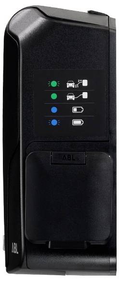 Svart JBL-batterisenhet/frontpanel med fyra statusindikatorer som visar gröna och blå lampor för ström- och batterinivåer; "ABL"-etikett nedan.